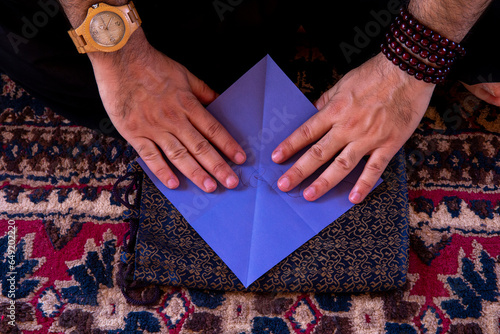 Zen sesshin (retreat) in the Sahara desert, Morocco. Origami paper folding workshop. photo