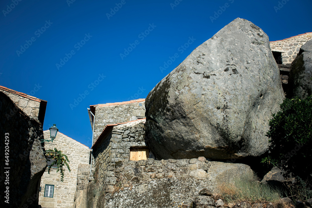 View of the houses among giant boulders in a medieval village of Monsanto, Portugal.