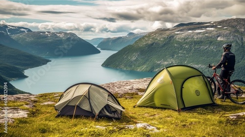 Tourism vacation and travel. Two tourist tents on the top of a mountain