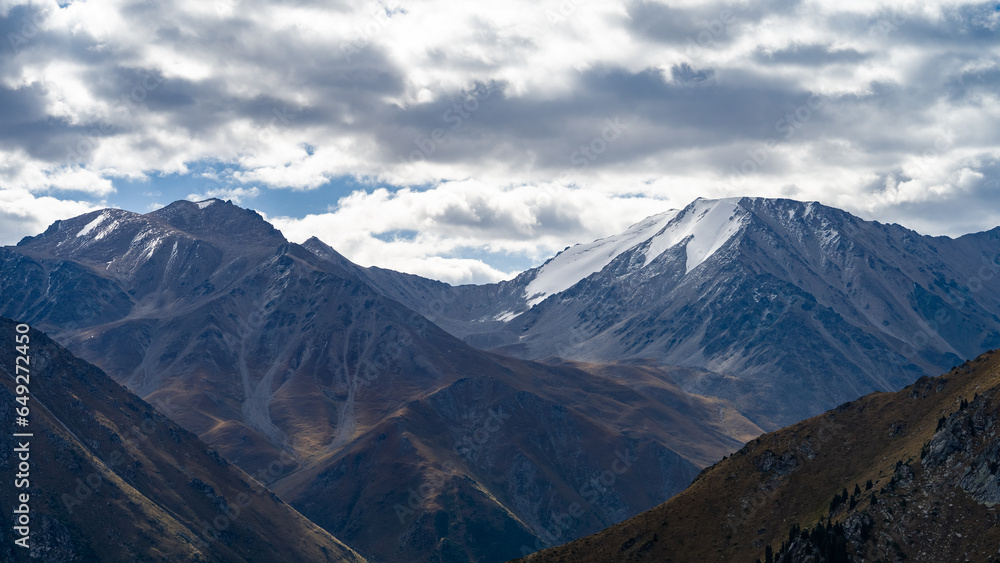 rocky mountain peaks in the clouds. fog in the mountains. highlands rocky mountain peaks in the clouds. fog in the mountains. highlands