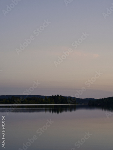 Fototapeta Naklejka Na Ścianę i Meble -  Einafjorden Lake, Toten, Norway, at dusk.
