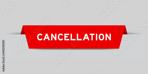 Red color inserted label with word cancellation on gray background