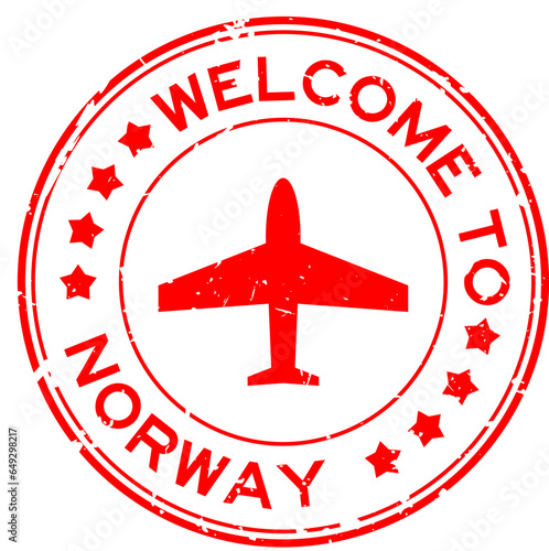 Grunge red welcome to norway word with plane icon round rubber seal stamp on white background