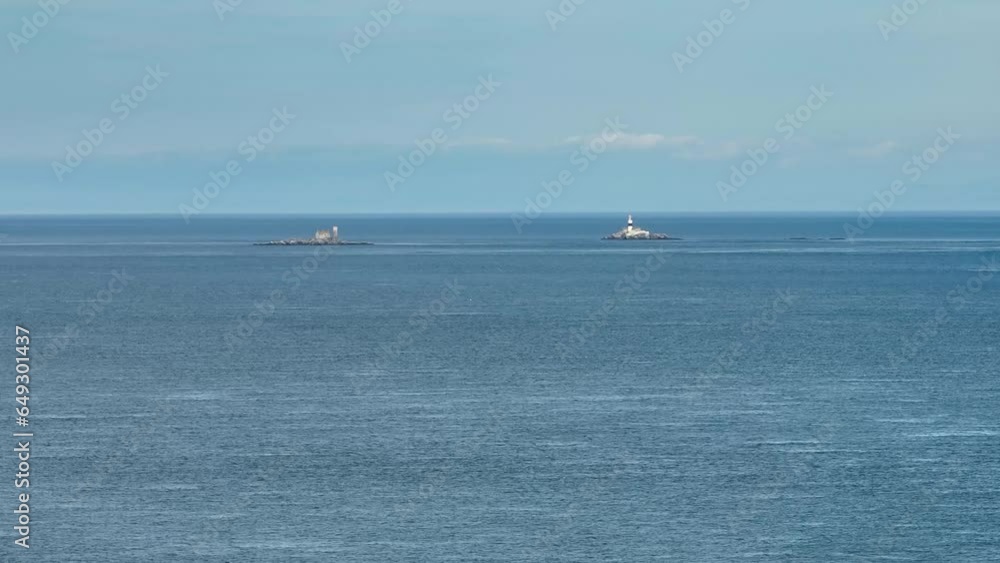 Aerial video of The Maidens lighthouses in the Irish Sea County Antrim between Northern Ireland and Scotland Aerial video of The Maidens lighthouses in the Irish Sea County Antrim between Northern Ireland and Scotland