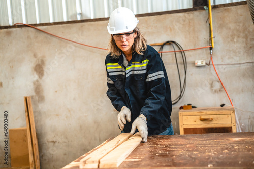 woman carpenter worker wear...