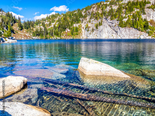 Insanely clear and blue water of Robin Lake in thge Central Cascades, Alpine lake region, Washington, USA photo