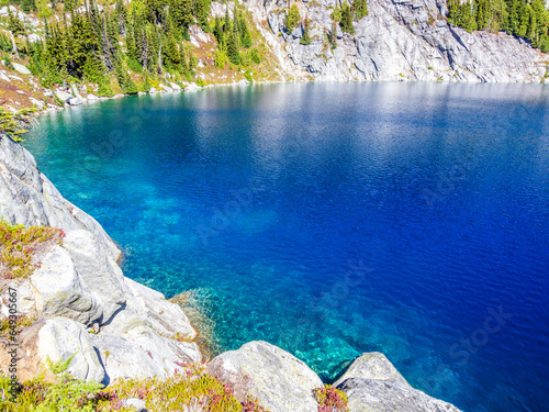 Insanely clear and blue water of Robin Lake in thge Central Cascades, Alpine lake region, Washington, USA photo