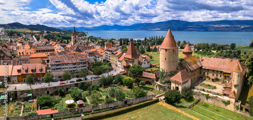 Switzerland scenic places. Estavayer-le-lac - charming traditional village, lake Neuchatel. aerial drone video of medieval castle. Canton Fribourg. photo
