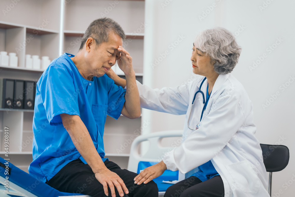 Senior elderly male patient and asian people mature woman doctor, showcasing importance of healthcare expertise and patient support. caring senior doctor assisting elderly patient in hospital bed Senior elderly male patient and asian people mature woman doctor, showcasing importance of healthcare expertise and patient support. caring senior doctor assisting elderly patient in hospital bed