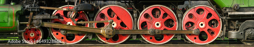 Red wheels of antique steam locomotive
