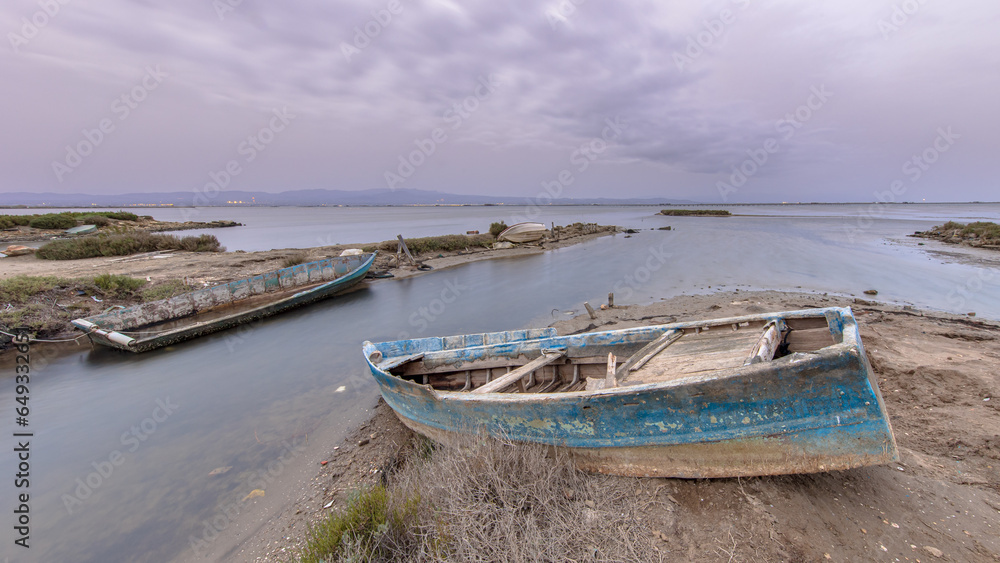 Wrecks of fishing boats in natural harbour Wrecks of fishing boats in natural harbour