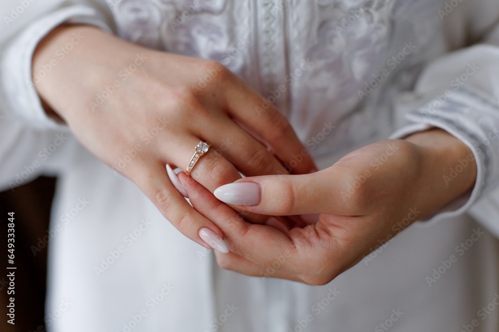 Picture of man and woman with wedding ring.Young married couple holding hands, ceremony wedding day. Newly wed couple's hands with wedding rings