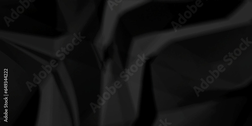 Dark crumple black paper wrinkled poster template ,blank glued creased paper texture background. black paper crumled backdrop background. used for cardboard and clarkboard.