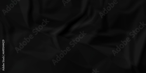 Dark crumple black paper wrinkled poster template ,blank glued creased paper texture background. black paper crumled backdrop background. used for cardboard and clarkboard.