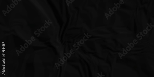 Dark crumple black paper wrinkled poster template ,blank glued creased paper texture background. black paper crumled backdrop background. used for cardboard and clarkboard.