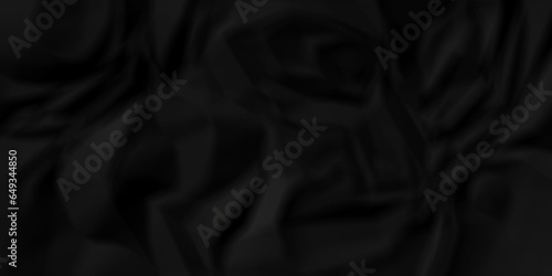 Dark crumple black paper wrinkled poster template ,blank glued creased paper texture background. black paper crumled backdrop background. used for cardboard and clarkboard.