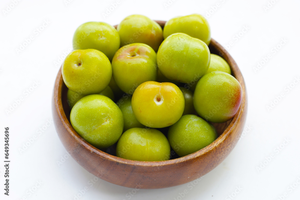 Fresh green plum on white background Fresh green plum on white background