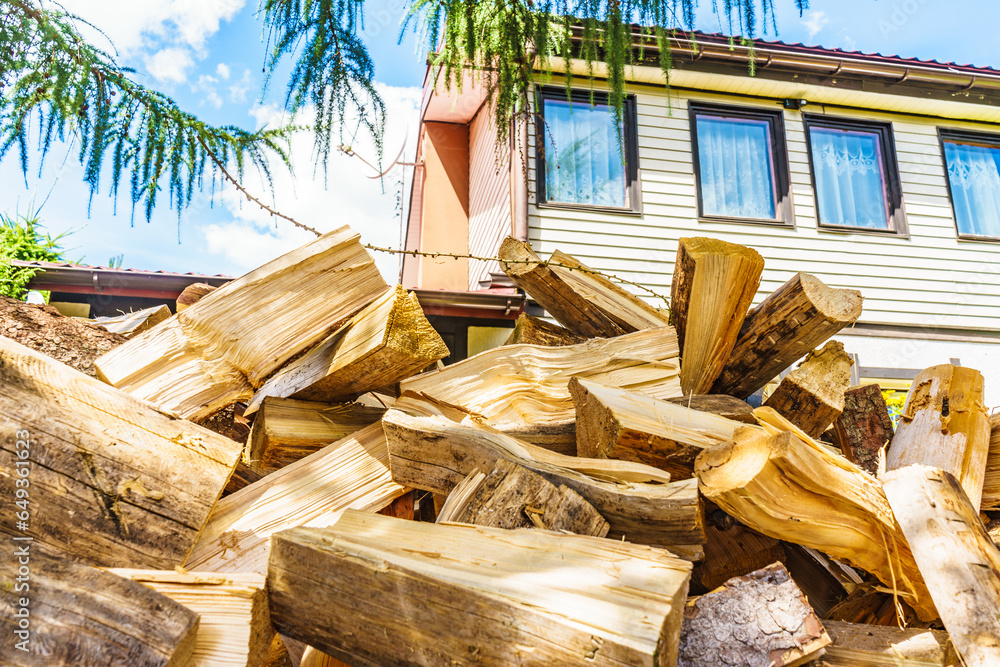 Stack of firewood at house Stack of firewood at house