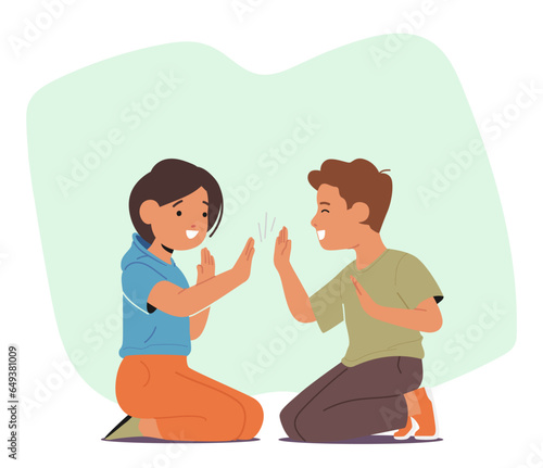 Children Gleefully Engage In A Playful Game Of Patty-cake, Clapping Hands Rhythmically And Exchanging Joyful Smiles
