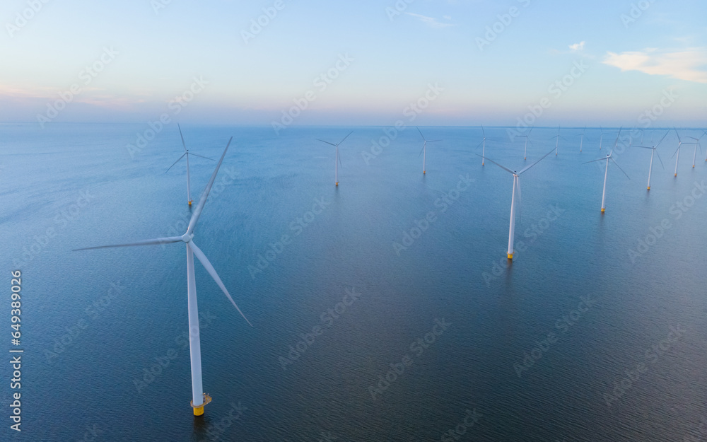 Aerial view of wind turbines at sea, North Holland, Netherlands Aerial view of wind turbines at sea, North Holland, Netherlands