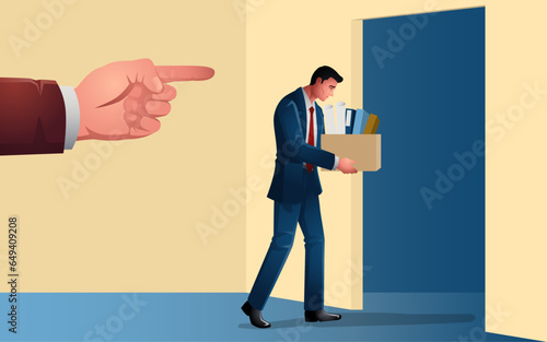 Disheartened businessman walks languidly, carrying a box filled with his personal belongings as he heads towards the door of uncertainty, symbolising the challenging moment of being laid off from job
