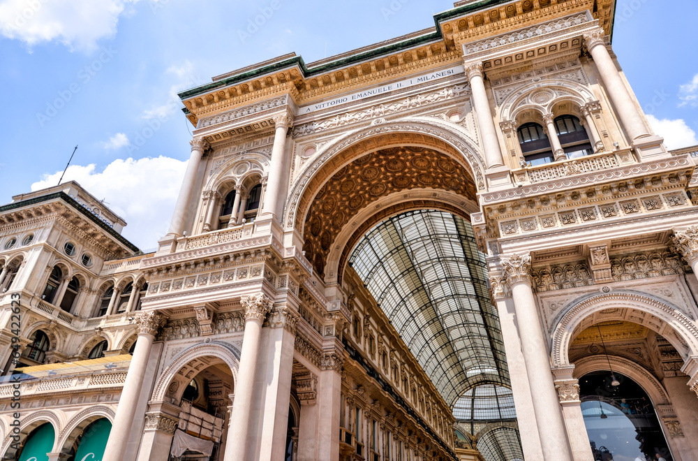 Milan, Italy - July 12, 2022: The entrance canopy architecture of the iconic Galleria Vittorio Emanuele II in Milan
