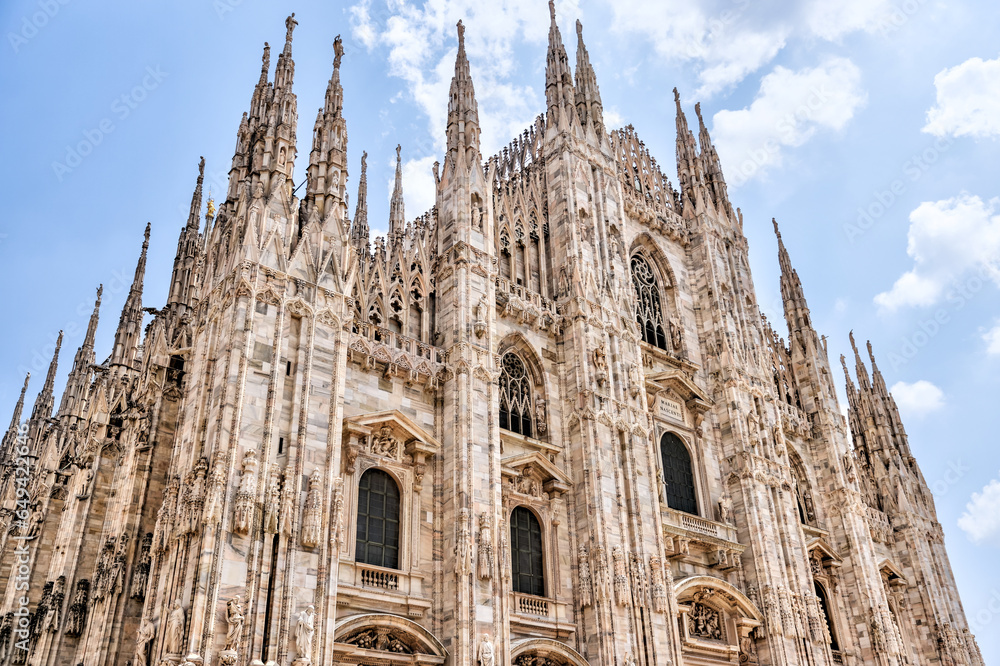 Milan, Italy - July 12, 2022: Exterior views of the Duomo Cathedral in Milan

