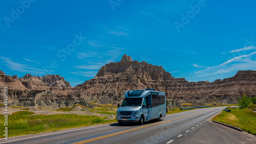 Traveling in Rv on open road through the badlands of South Dakota on a beautiful day