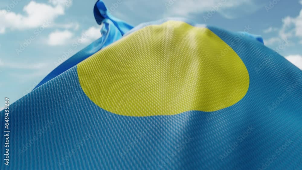 Wavy flag of Palau blowing in the wind in slow motion. Waving official ...