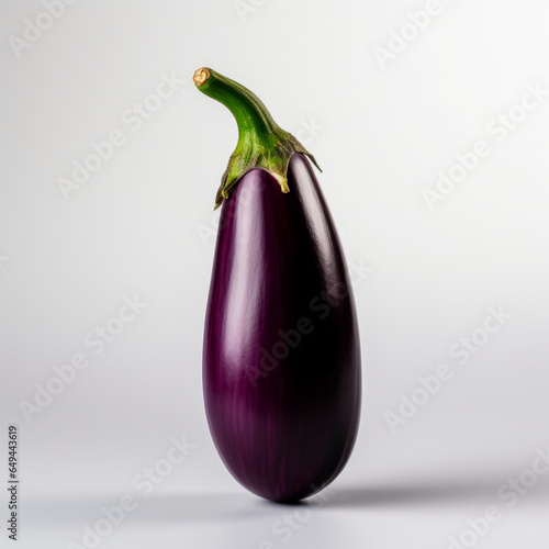 Ripe eggplant on a light background. Minimalism.