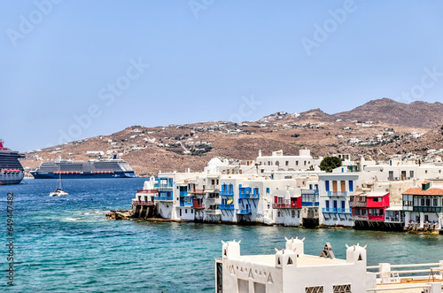 Mykonos, Greece - July 21, 2023: The iconic Little Venice waterfront buildings along the shores of Mykonos Town in Greece 