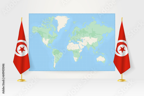 World Map between two hanging flags of Tunisia flag stand.