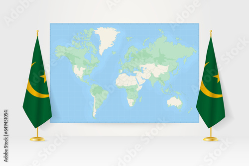 World Map between two hanging flags of Mauritania flag stand.