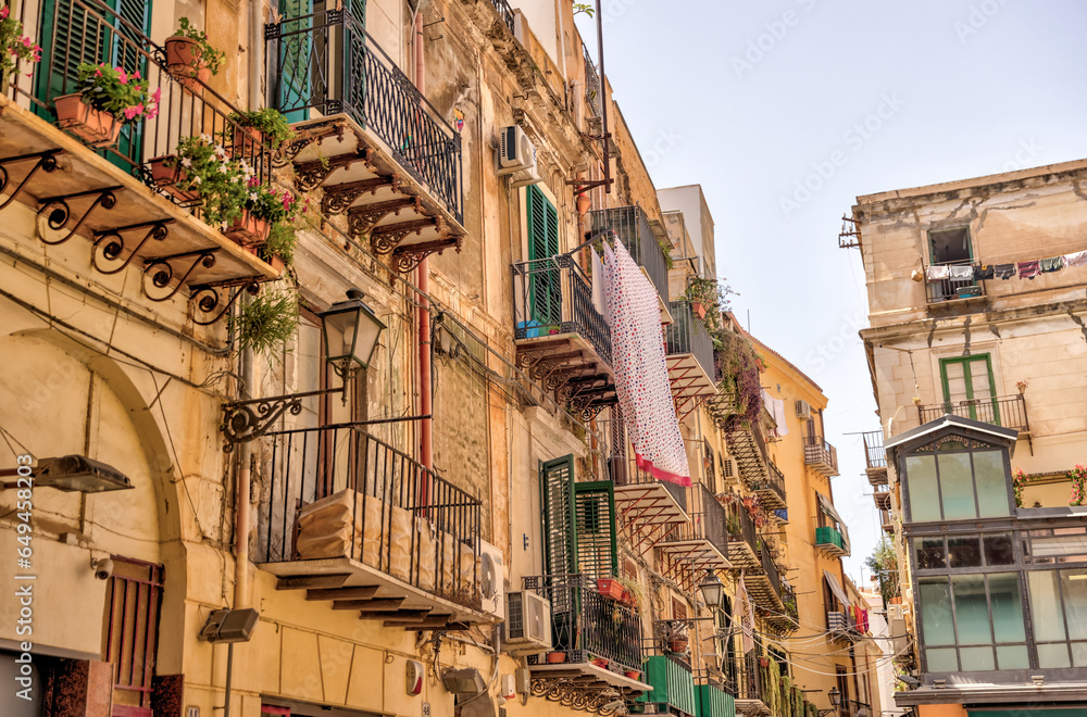 Palermo, Italy - July 18, 2022: Classic architecture and building facades on the streets in Palermo
