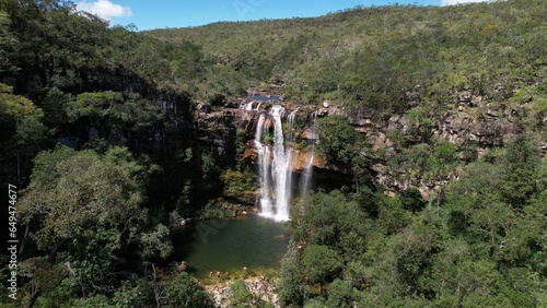 aerial view of the Cachoeira do Cordovil waterfall in Chapada dos Veadeiros Goi  s Brazil green water  sunny day  waterfall  rocks and vegetation of the cerrado