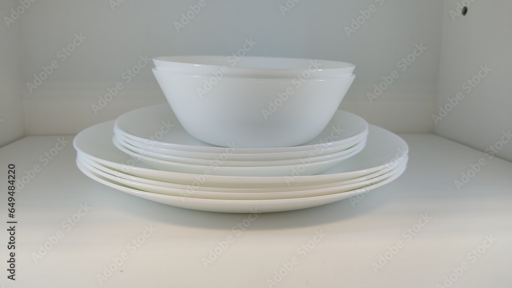 stack of white bowls stack of white bowls