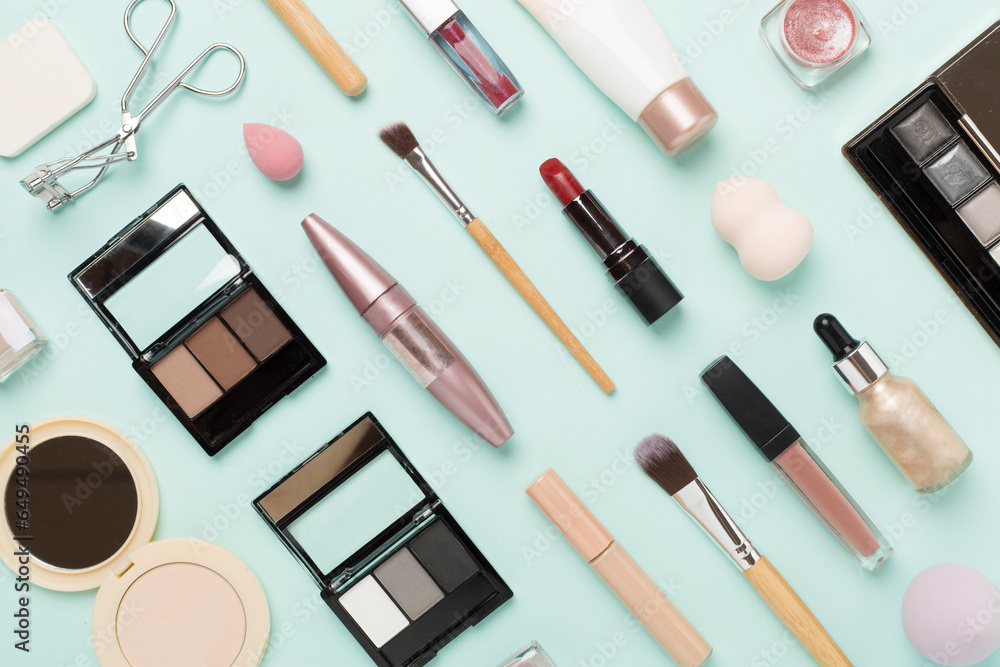 Flat lay with makeup products and tools on color background Flat lay with makeup products and tools on color background
