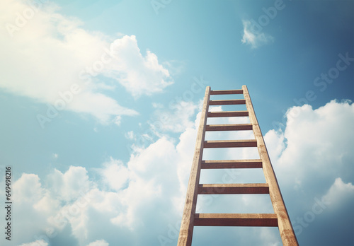 Wood ladder against the blue sky. Business or climbing corporate ladder metaphor. Copy space