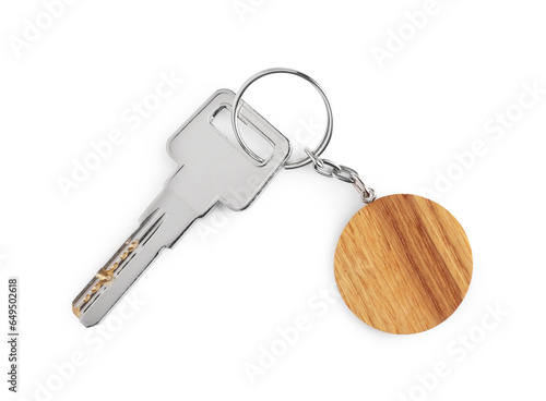 Key with wooden keychain isolated on white, top view