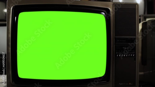 Vintage TV Green Screen. Close Up. Front View. You can replace green screen with the footage or picture you want with “Keying” effect in After Effects (check out tutorials on YouTube). 4K.