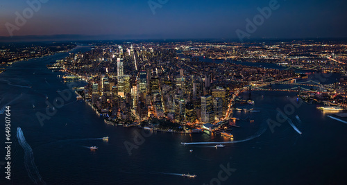 Aerial view of lower Manhattan illuminated at night photo