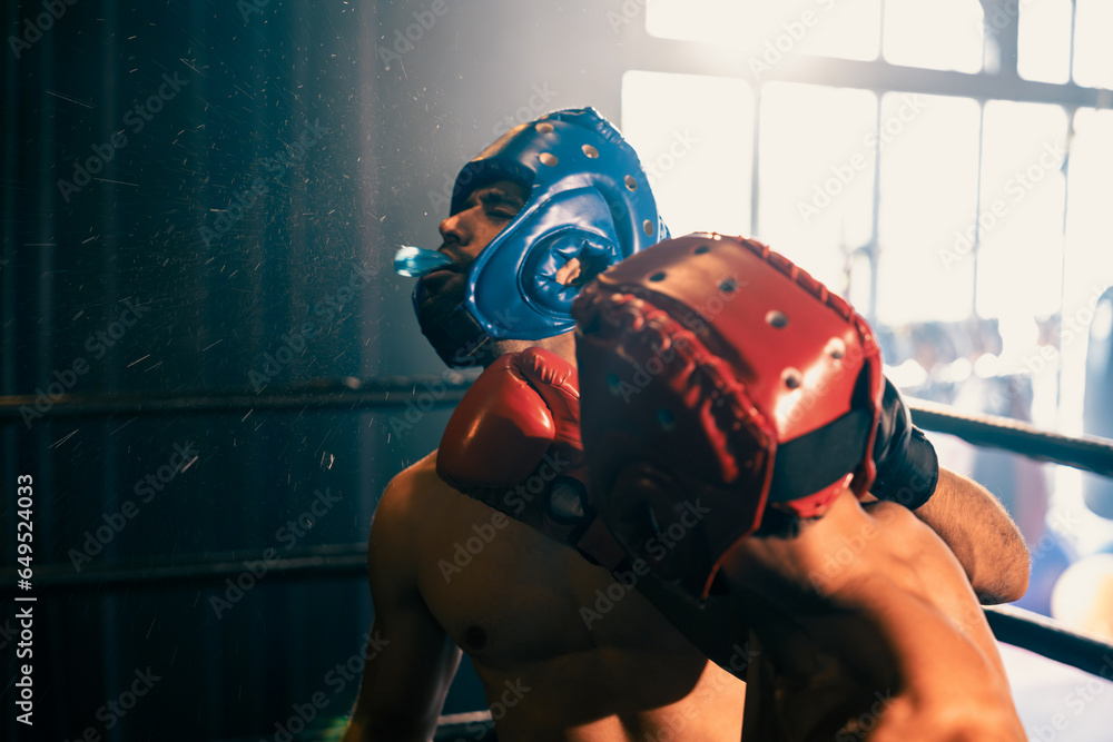 Two athletic and muscular body boxers with safety helmet or boxing head ...