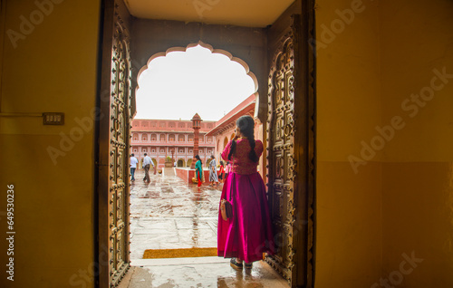 Photography Woman tourist taking photos travel spots in Jaipur, India.