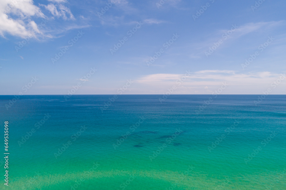 Waves sea water surface nature background,Sun rays over sea, Bird's eye view ocean in sunny day,Sea ocean waves water background