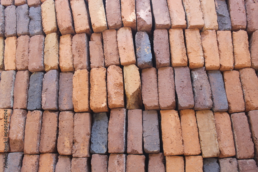 pile of red bricks to build a house pile of red bricks to build a house