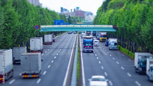 A timelapse of miniature traffic jam at the downtown street in Tokyo zoom photo