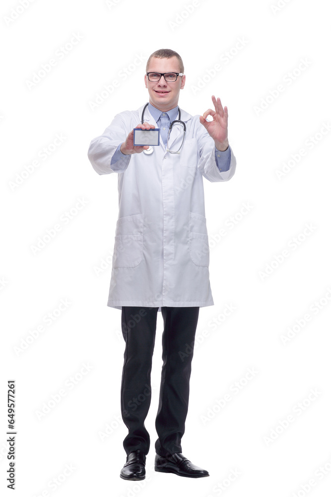 Young smiling doctor holding business blank card Young smiling doctor holding business blank card
