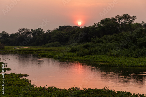 Beautiful sunset landscape by Pixaim River, Pantanal of Poconé