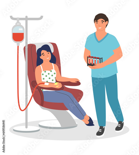 Woman blood donor giving donation in hospital