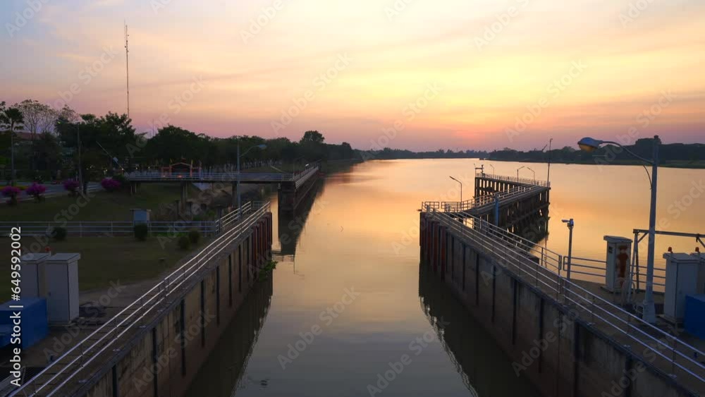 4K timelapse video of sunset at Chao Phraya Dam in Chainat Province. 4K timelapse video of sunset at Chao Phraya Dam in Chainat Province.